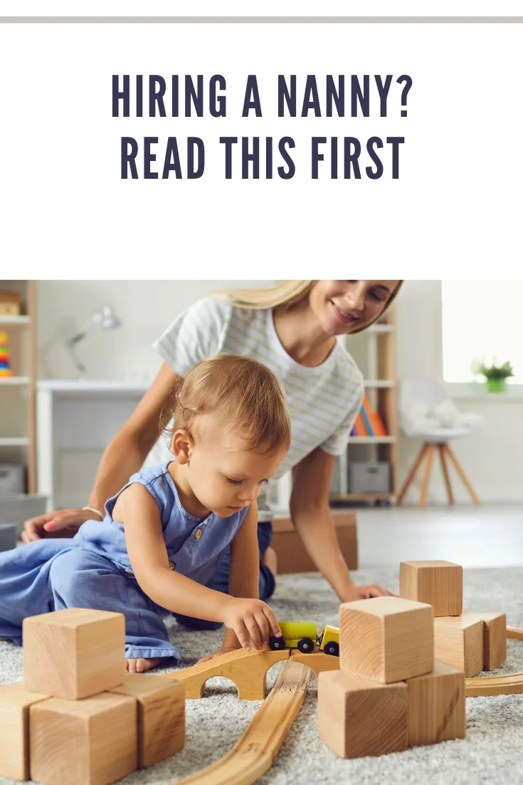 young nanny playing with toddler