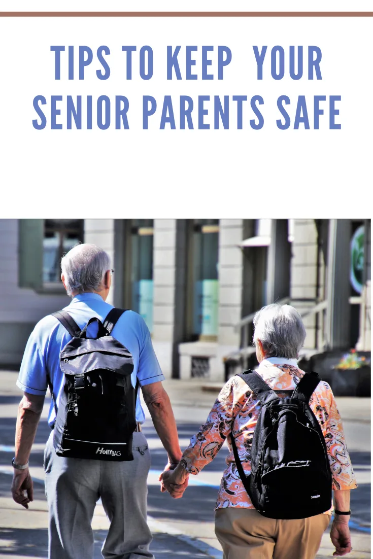 senior couple with backpacks walking together