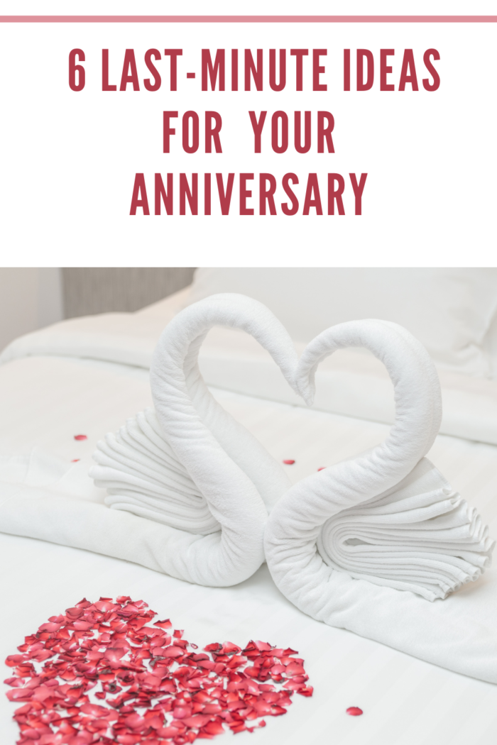 Swan Towels on the Bed with Rose Petals