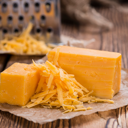 grated cheddar with block of cheddar cheese