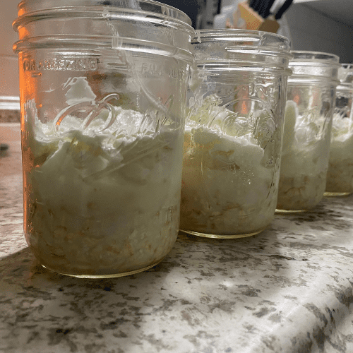 yogurt, milk and oats in mason jar