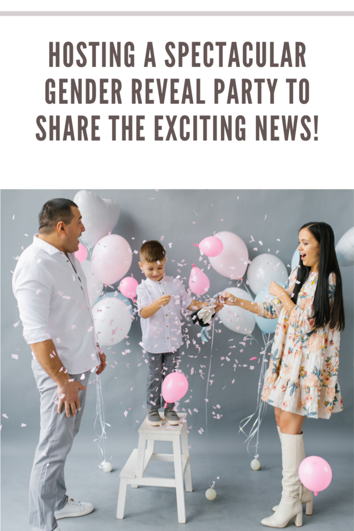 Gender Reveal Party. Stylish Beautiful Family with a Baby Pop