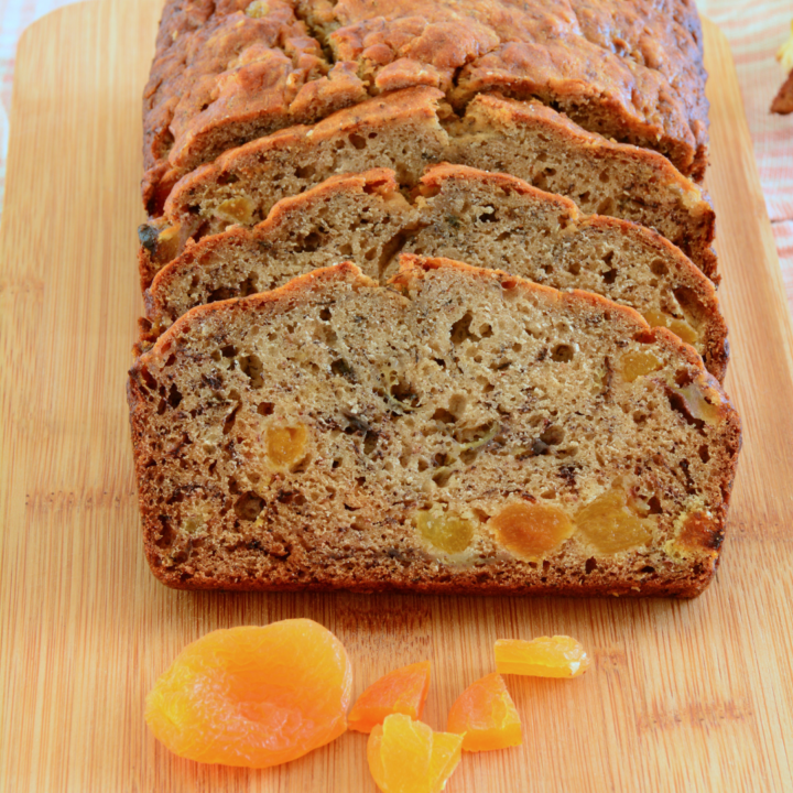 apricot banana bread with apricot on cutting board