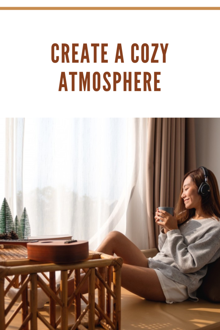woman with headphone in cozy home