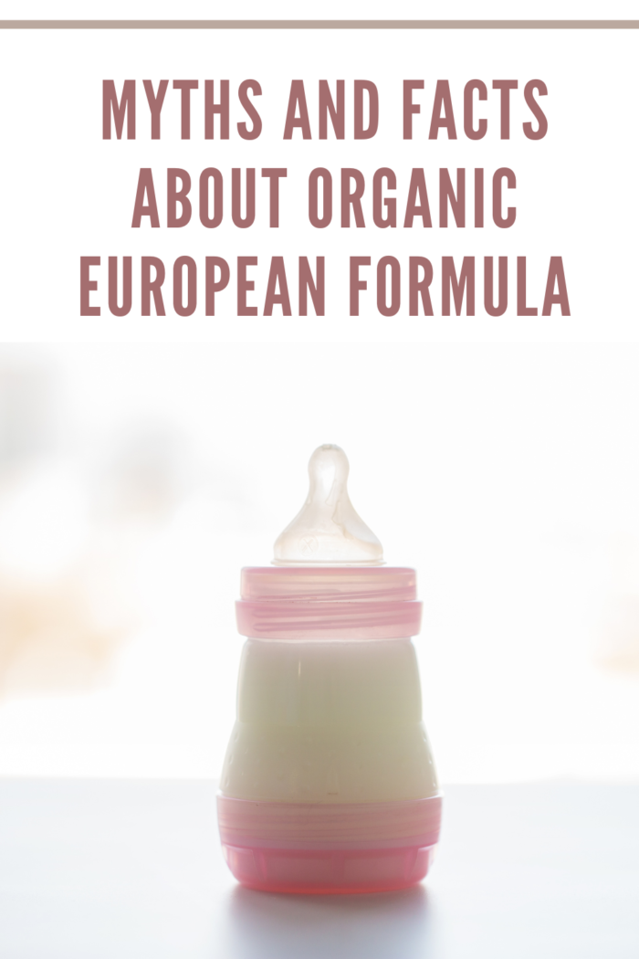 Infant Milk Formula in Baby Bottle on Table