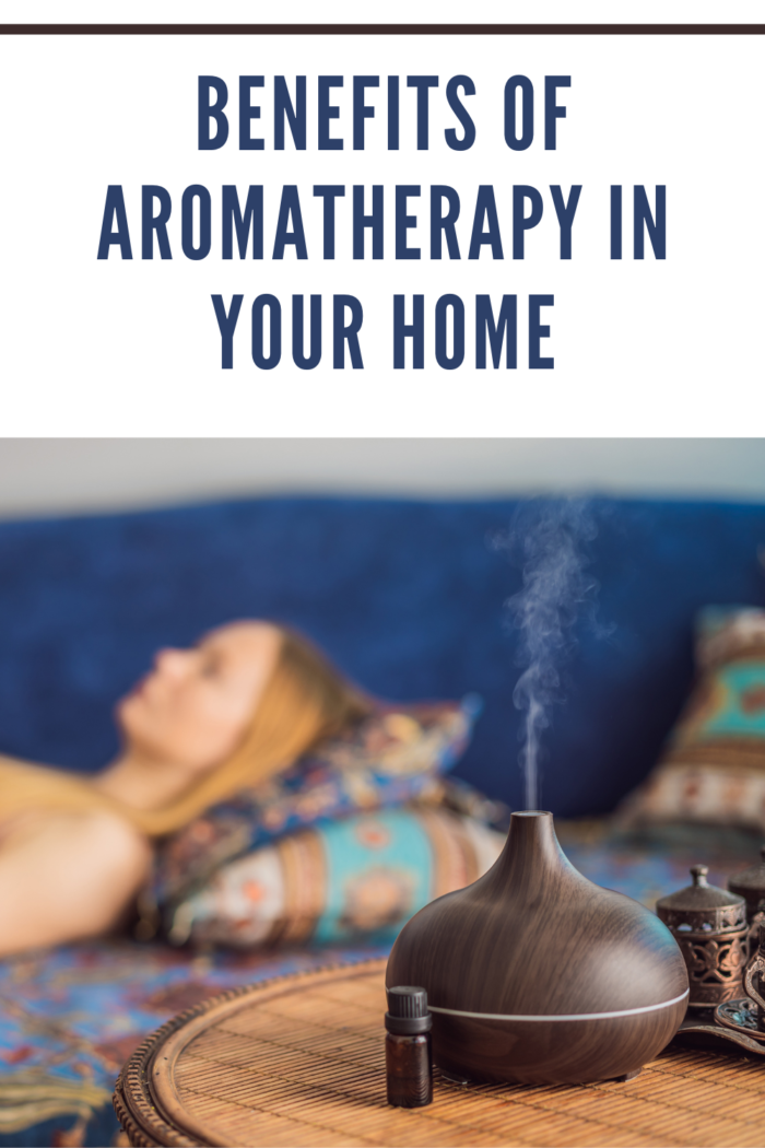 Aromatherapy Concept. Wooden Electric Ultrasonic Essential Oil Aroma Diffuser and Humidifier. Ultrasonic Aroma Diffuser for Home. Woman Resting at Home