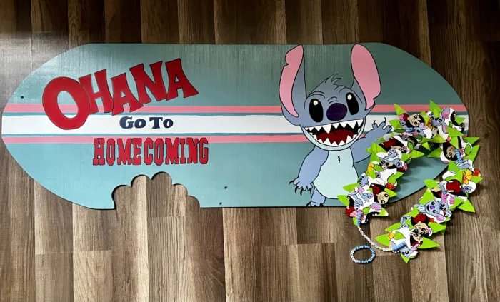 stitch hoco proposal surfboard with matching lei