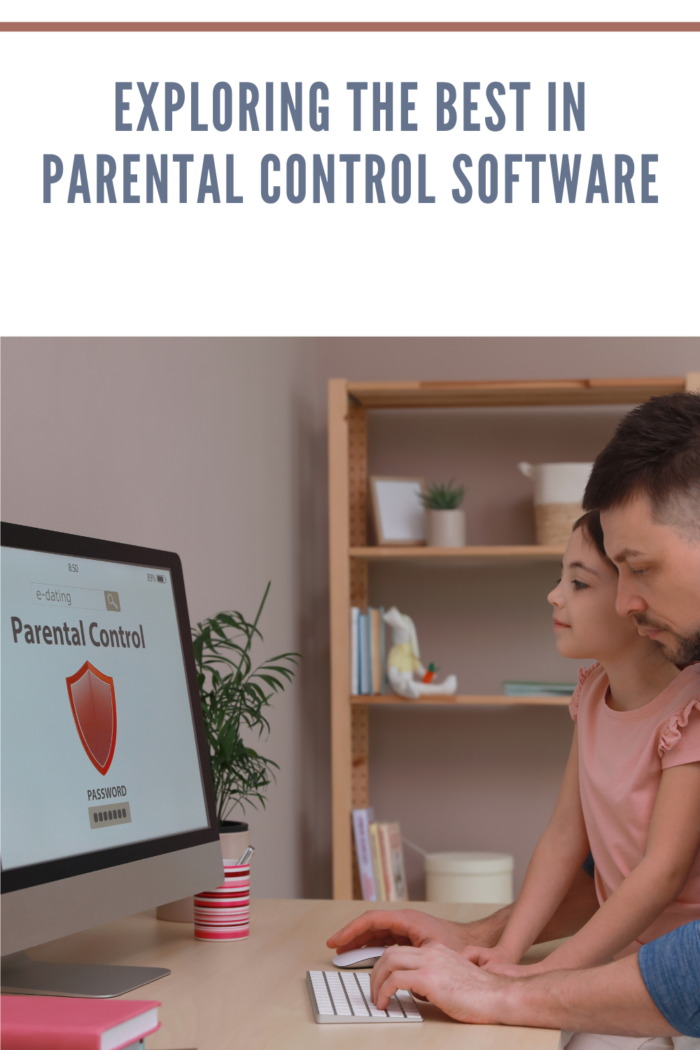 Dad Installing Parental Control on Computer at Table Indoors.