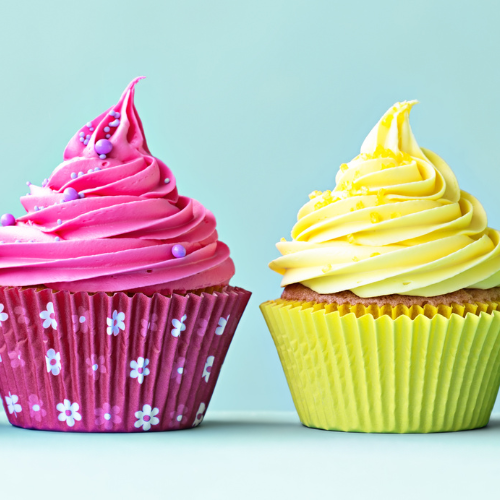yellow and magenta frosted cupcakes
