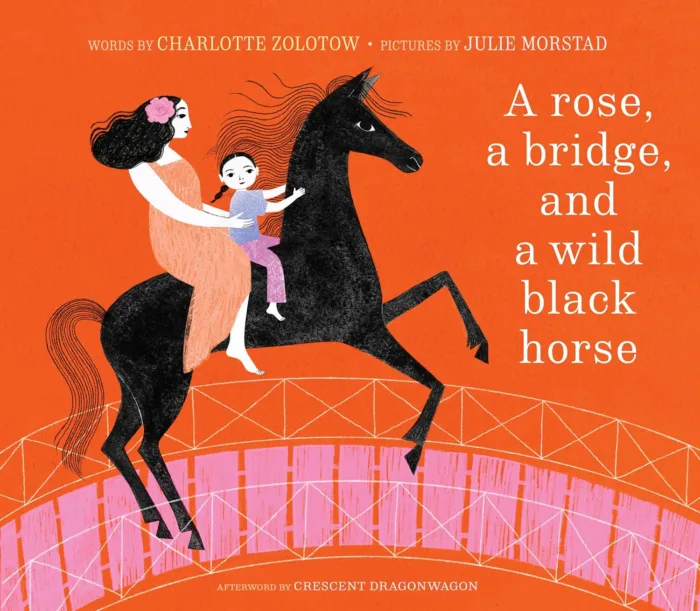 a rose a bridge and a wild black horse