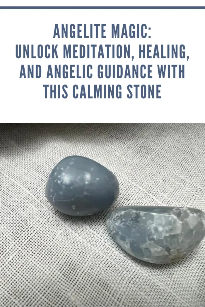Two polished Angelite stones placed on a textured gray surface, showcasing the calming and gentle appearance of the crystal.