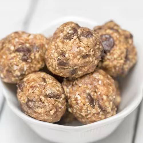 Kodiak Cakes protein bites displayed on a plate, highlighting their texture and nutritional ingredients.