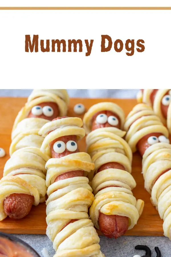 Mummy dog wrapped in crescent dough, showcasing a fun Halloween recipe