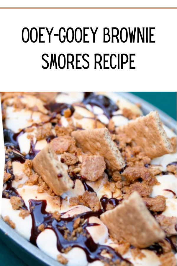 Delicious ooey-gooey brownie s'mores with golden toasted marshmallows and rich hot fudge sauce