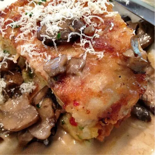 Delicious stuffed chicken marsala topped with a creamy mushroom Marsala sauce, perfect for an Olive Garden copycat recipe.