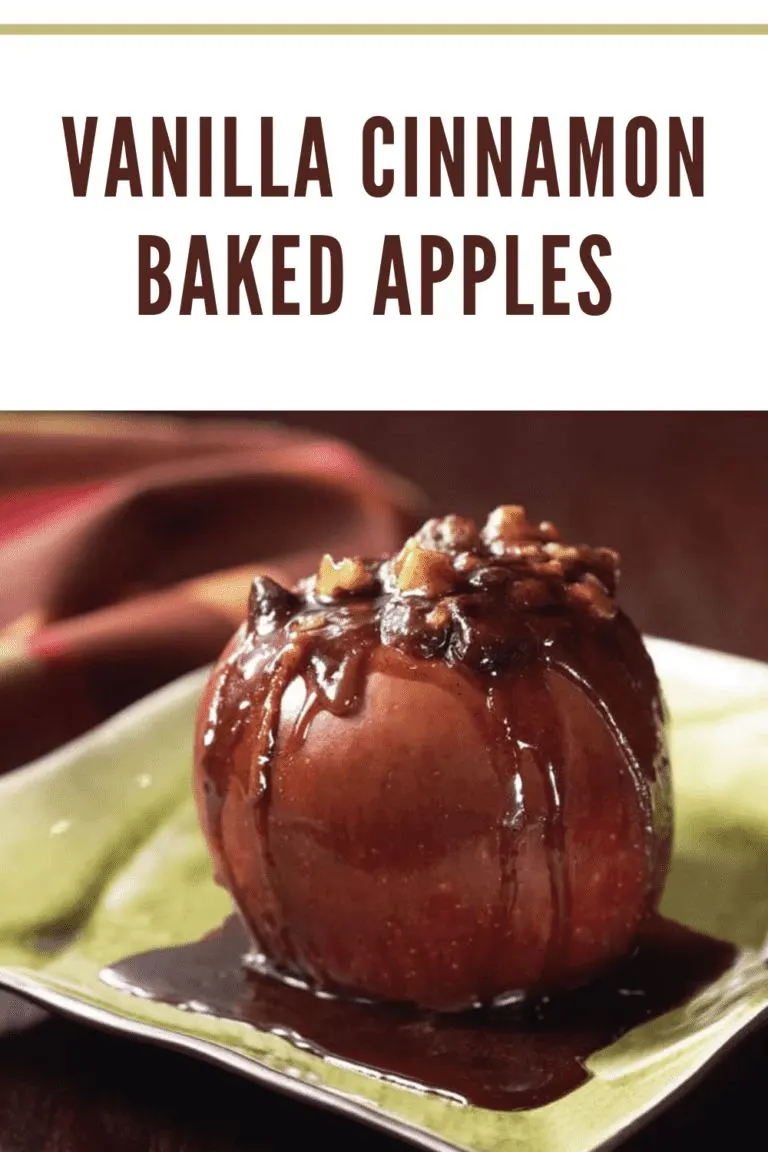 Close-up of vanilla cinnamon baked apples in a baking dish, topped with caramelized walnuts and raisins, ready to serve