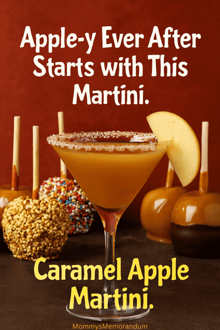 Elegant Caramel Apple Martini in a glass with a salted caramel rim and apple garnish, surrounded by assorted caramel apples with sprinkles, peanuts, and chocolate. Warm autumn tones and festive presentation make this the perfect fall cocktail.