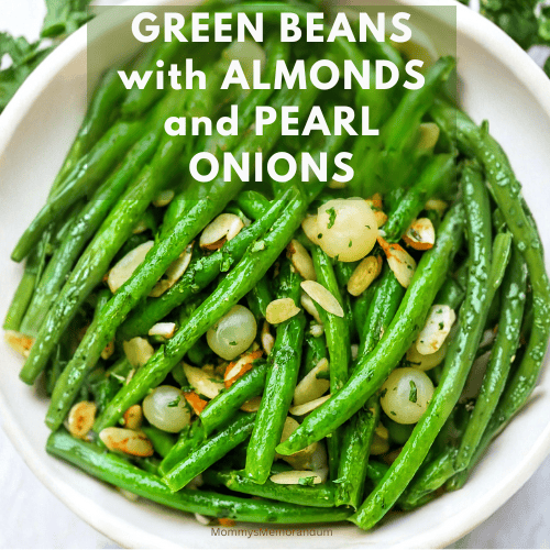 Close-up of buttery green beans with toasted almonds and pearl onions in a white serving dish. The beans are vibrant and glistening, styled for a holiday table with a cheeky text overlay: “Lettuce change your mind: GREEN BEANS with ALMONDS and PEARL ONIONS.”