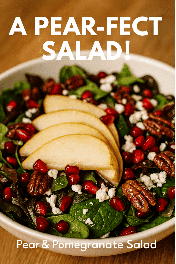 Pear & Pomegranate Salad with Candied Pecans Pear and pomegranate salad — mixed greens with sliced pears, pomegranate seeds, candied pecans and crumbled feta in a white bowl