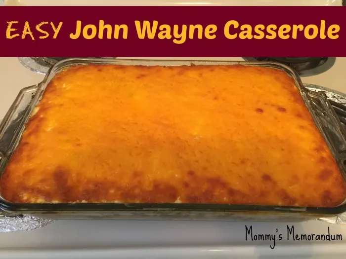 Cheesy John Wayne Casserole with ground beef, tomatoes, biscuits, and cheddar cheese, baked to perfection