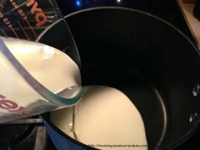 Heat the heavy cream in a saucepan until simmering