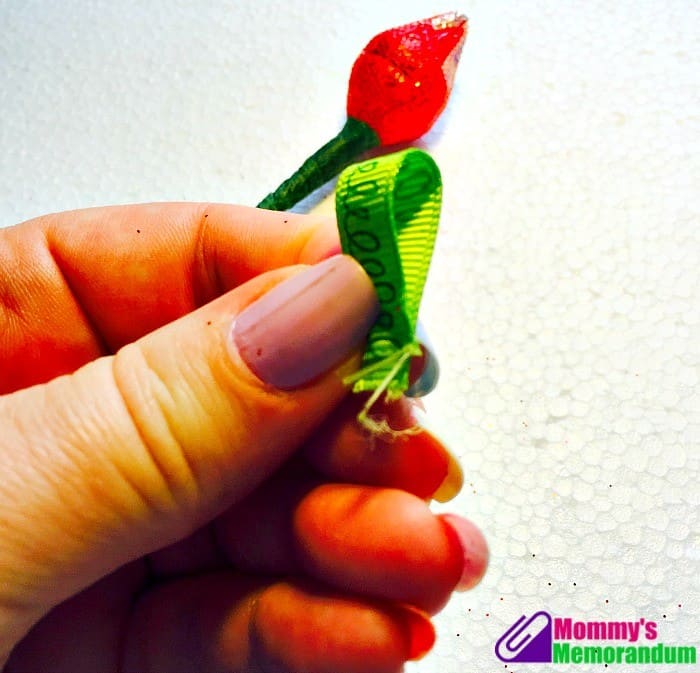 Hershey Kisses Roses adding a ribbon leaf