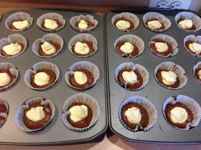 continue until all cupcakes have the cream cheese mixture on top of them