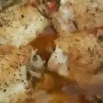 Close-up of Instant Pot Chicken Cacciatore featuring juicy chicken pieces in a rich tomato sauce, garnished with pepper