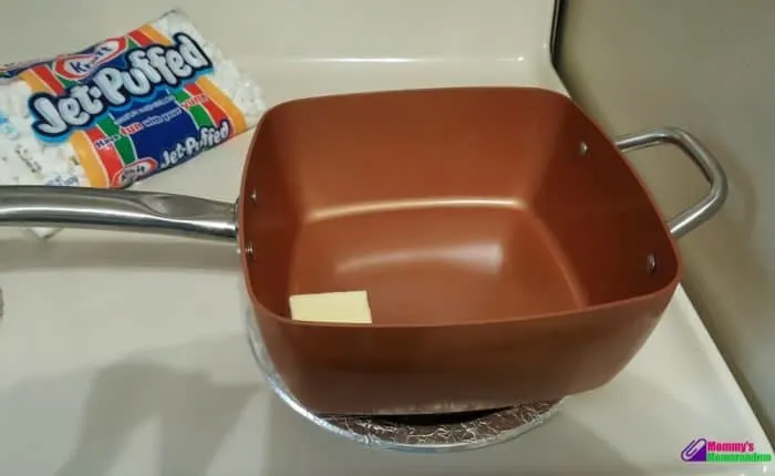 copper chef with butter