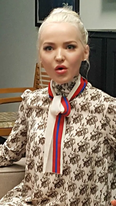 dove cameron looking into camera