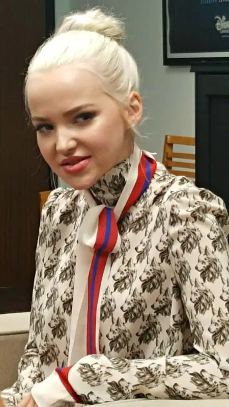 dove cameron side glance