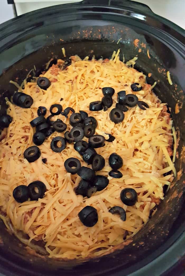 easy chicken enchilada casserole add remaining cheese and olives
