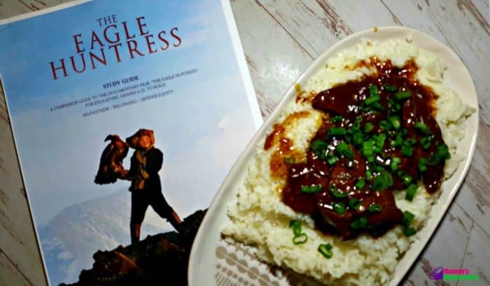 Easy Mongolian beef recipe on platter served over rice and topped with green onions, Instant Pot Mongolian Beef: You will never guess so much flavor could be packed into just 20 minutes of cooking time! Easy to make and beats take-out too! #InstantPotRecipe #instantpotmongolianbeef #instantpotbeef #instantpotasianfood