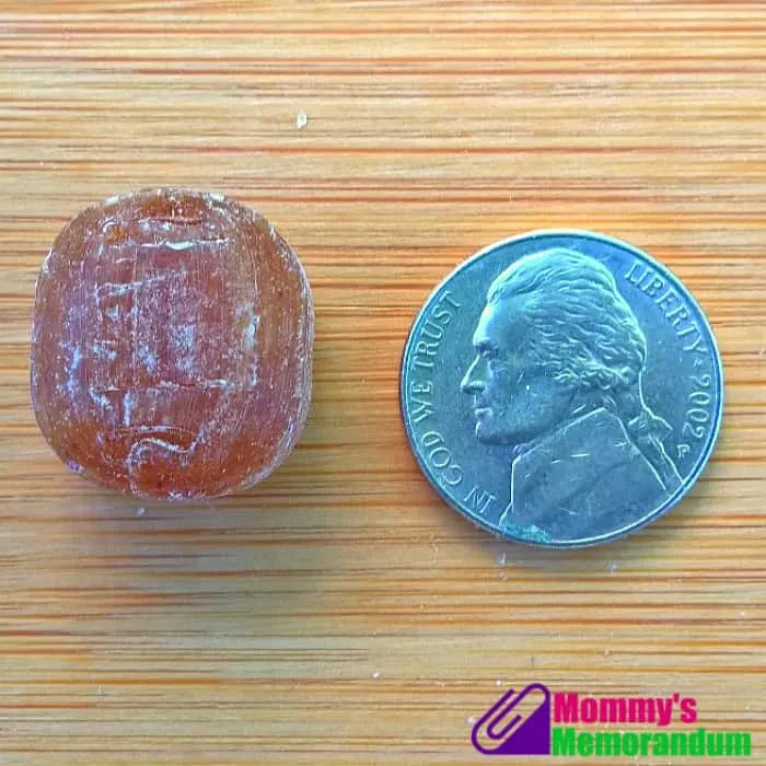 goorganic hard candy about the size of a nickel