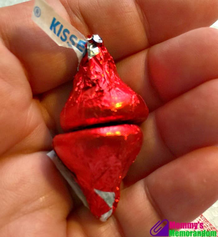Close-up of two red Hershey Kisses paired together for making a Hershey Kisses rose.