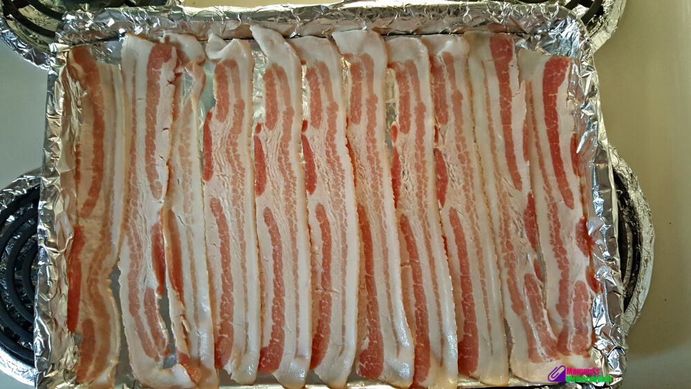 how to make bacon in the oven place bacon on pan