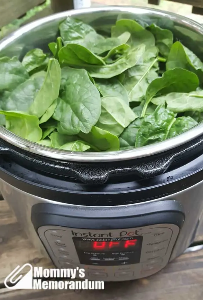 Instant Pot Recipe: Chicken with Mushrooms and Artichoke Hearts adding the spinach
