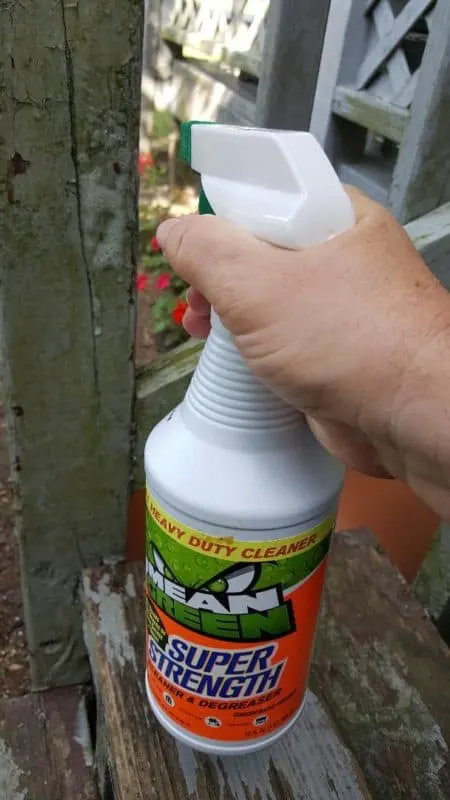 mean green super strength spraying the porch