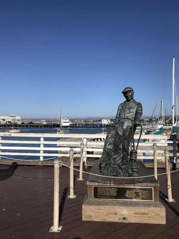 The-fisherman-statue-by-Jesse-Corsaut-Old-Fishermans-Grotto-Wharf-Monterey-CA