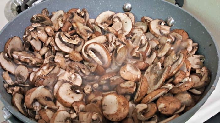 Terra's Kitchen adding mushrooms to the pan