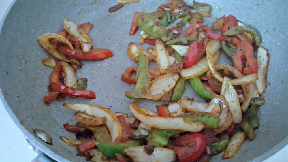 terra's kitchen vegetable quesadilla cooking the peppers and onions