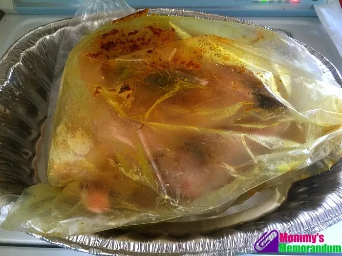 Jennie-O Oven Ready Turkey in a roasting bag within a pan, seasoned and ready to cook, demonstrating hassle-free preparation.
