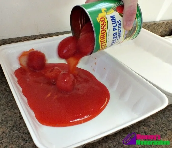 I first opened the can of Tuttorosso Tomatoes and gently poured the tomatoes and juice into the styrofoam tray.