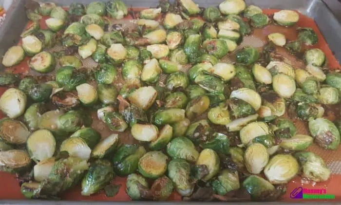 umami brussel sprouts coated with sauce