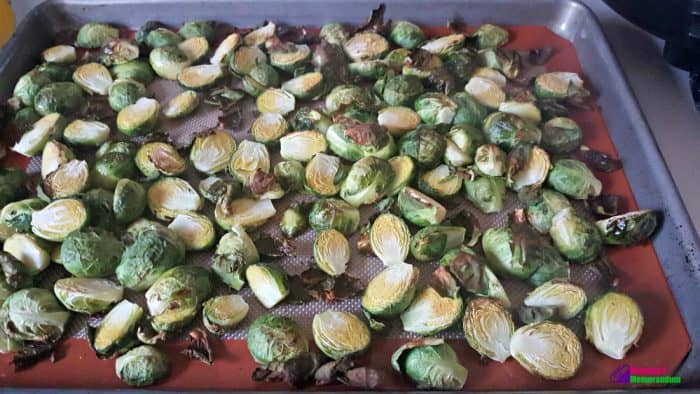 Roasted Brussels sprouts with crispy, golden edges, showcasing a delicious umami coating