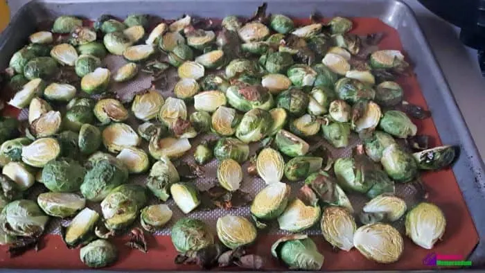 Roasted Brussels sprouts with crispy, golden edges, showcasing a delicious umami coating