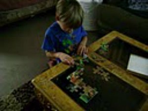 william putting together puzzle