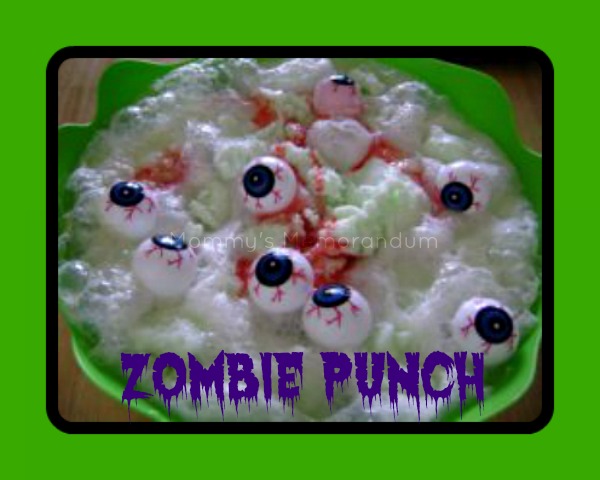 Spooky Zombie Punch with lime sherbet and plastic spiders, perfect for Halloween parties